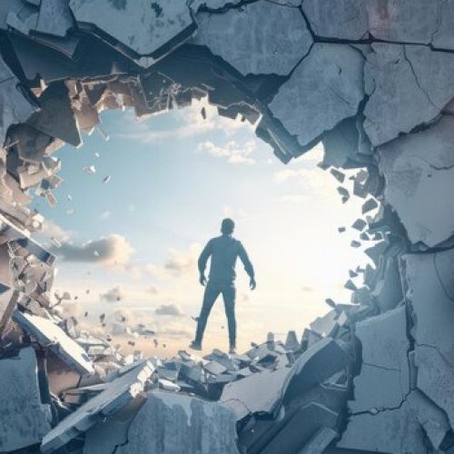 broken-barrier-wall-with-person-breaking-through-illustrating-challenge-breaking-limits_693425-63148
